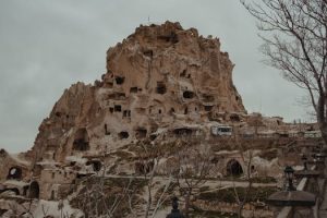 Cave hotels carved into ancient cliffs