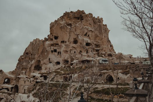 Cave hotels carved into ancient cliffs